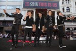 LONDON, ENGLAND - August 20, 2013: (L-R) Liam Payne, Louis Tomlinson, Zayn Malik, Harry Styles and Niall Horan at the world premiere for Tristar Pictures' ONE DIRECTION THIS IS US at Empire Theatre, Leicester Square in London, England. Photo by David Dettman.