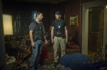 Sarchie (ERIC BANA) and Butler (JOEL McHALE) investigate the Alberghetti home, where strange things have been happening in Screen Gems' DELIVER US FROM EVIL.