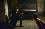 Mendoza (EDGAR RAMIREZ) holds off the attacking Jimmy (CHRIS COY) with the power of the crucifix, prayer and holy water.