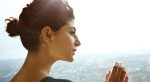 Girl looking down at the city